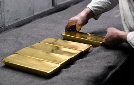 Gold supported in 2024 by bets on monetary policy easing, Mid-East war risks: Reuters poll